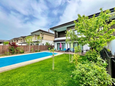 Swimming pool villa for sale 7 rooms Oxford Gardens compound, Bucharest 455 sqm