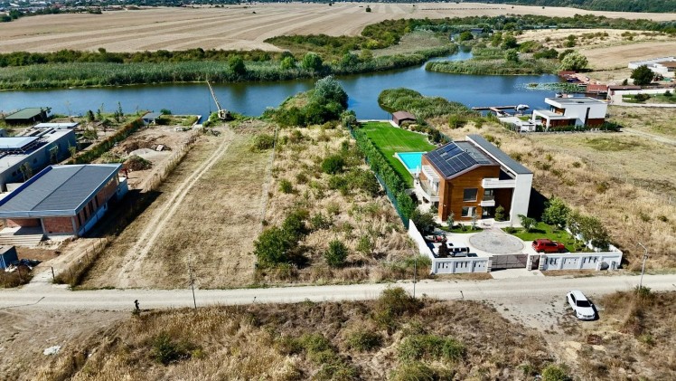 Teren intravilan de vanzare zona Izvorani - Snagov, deschidere la lac, judetul Ilfov 2.500 mp